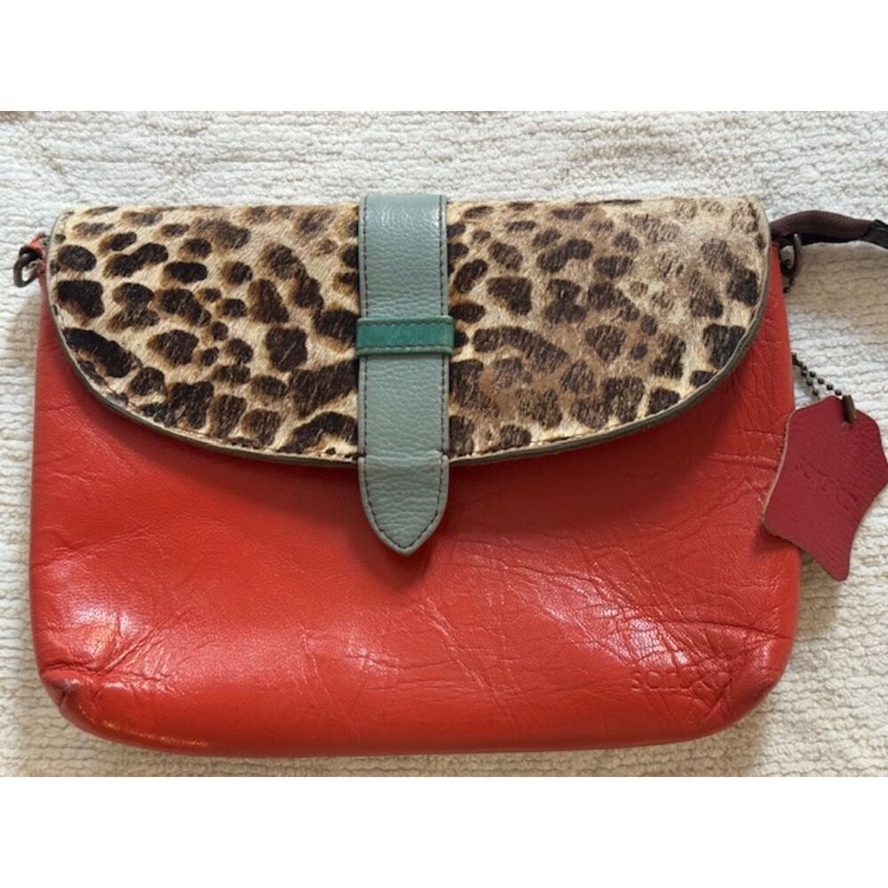Soruka Women's Saddle clutch, multicolor, animal print, wristlet.